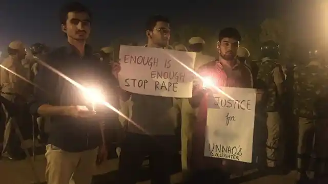 Public demanding justice for the 8-year-old at a candlelight vigil at India Gate, New Delhi. 