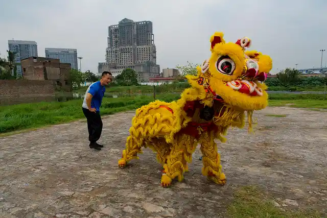 James Liao observes members of his Lion Dance troupe during practice at the new Chinatown of Tangra. He trained himself in Taiwan and started his group with some local boys.