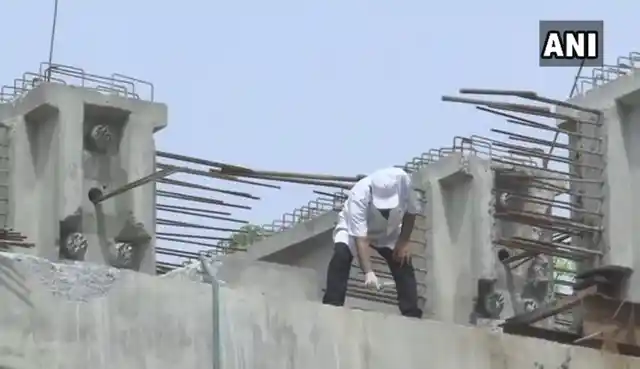 Forensics team conducts an investigation at the collapse site.