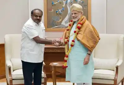 Karnataka Chief Minister H.D. Kumaraswamy calls on Prime Minister Narendra Modi, in New Delhi on 28 May 2018.