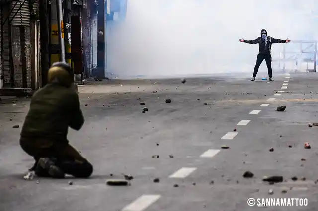 Protestor in a confrontation with the J&K police. 