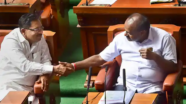 Karnataka Chief Minister HD Kumaraswamy (R) and his deputy G Parameshwara (L).