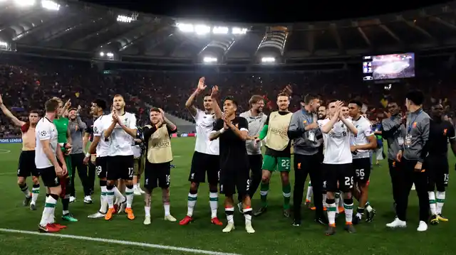 Liverpool players applaud the supporters at the end of the Champions League semifinal second leg soccer match between Roma and Liverpool at the Olympic Stadium in Rome, Wednesday, May 2, 2018. 