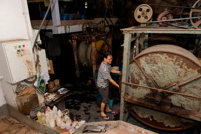 Victor Chu, 46, a Chinese-Indian of Hakka origin, works in his tannery at Bantala Leather Complex . 