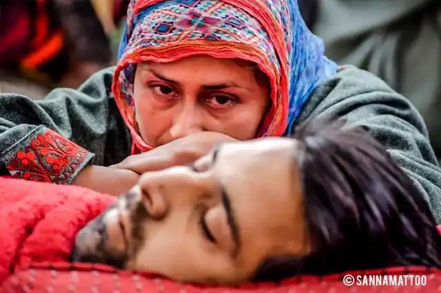 Sharjeel Ahmad Sheikh, a 30-year-old driver, was going to get married in a few days but lost his life in an encounter in Kulgam district. His fiance looks at his corpse as she mourns in death.