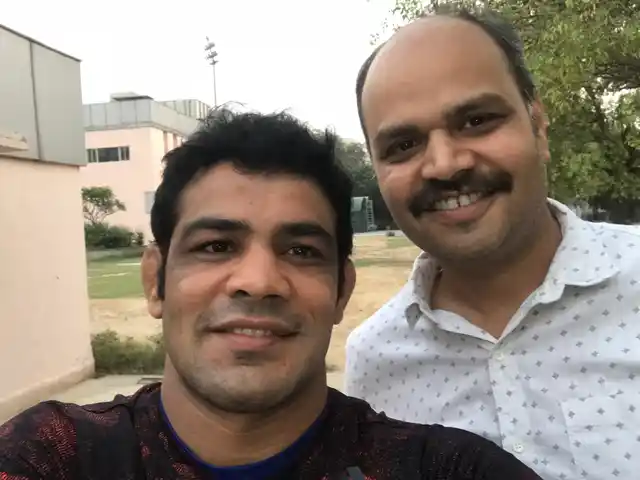 Sushil Kumar with the sports journalist Shivendra Kumar Singh.