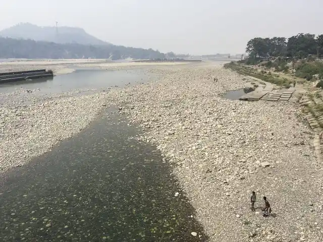 The largely dry river bed of the main channel of the Ganga at Haridwar on the day of the Ganga Dussehra.