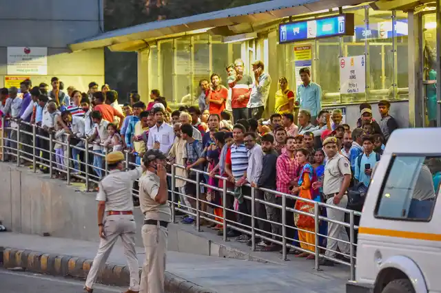 Security personnel manages crowd gathered outside All India Institute of Medical Sciences (AIIMS) hospital where former prime minister Atal Bihari Vajpayee is admitted.
