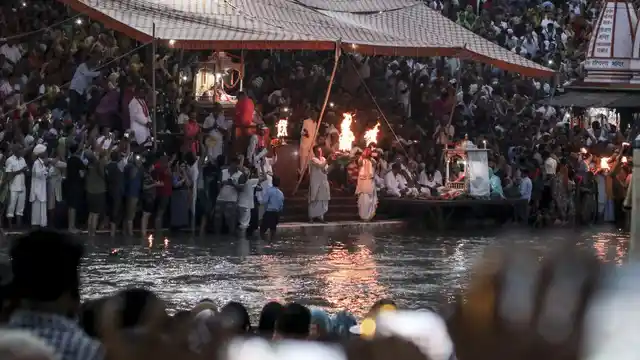 The evening Ganga Aarti (prayers) at the Har Ki Pauri ghat, the flames of faith at the river.