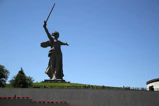 In this Sunday, June 17, 2018 photo, tourists visit the Motherland Calls monument which commemorates the victims of the Battle of Stalingrad, in which the Red Army turned back Nazi Germany’s army in Volgograd, Russia.