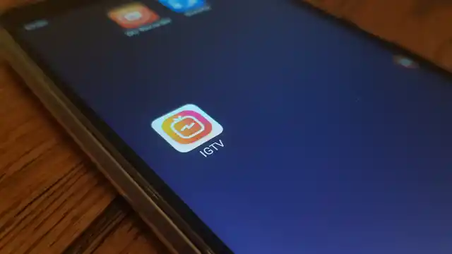 The IGTV app logo on a phone.