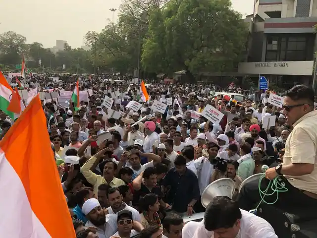 Protesters gather for the march against the Centre.