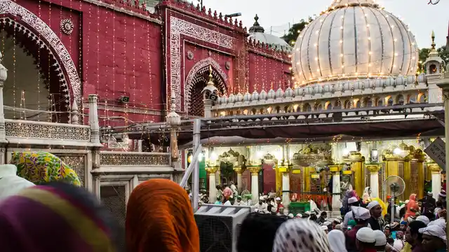 After the evening prayer, the shrine is all lit-up with people crowding in.