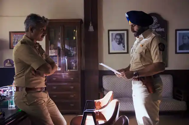 Saif Ali Khan and Neeraj Kabi in <i>Sacred Games.</i>