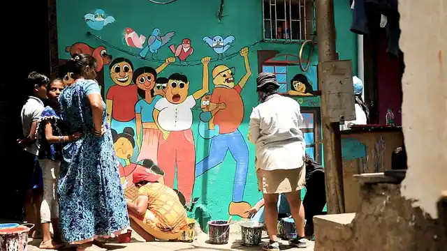 52 artists were invited to create murals on the walls of Khar Danda