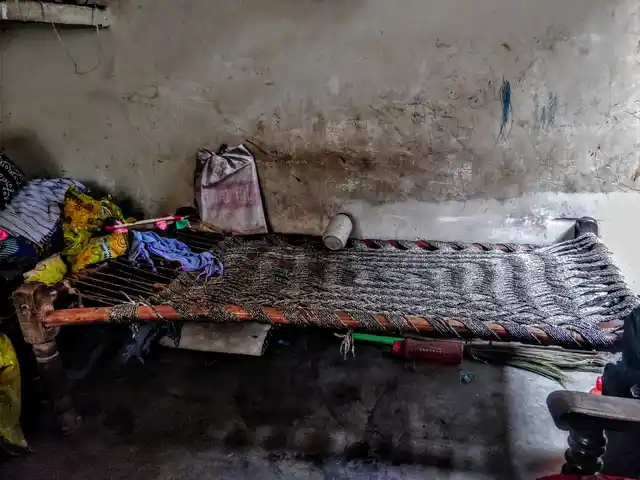 This is the bed that Abhishek prefers to sleep on, in the drawing room with relatives to keep him company.