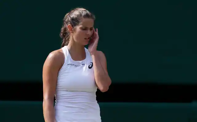 Germany’s Julia Gorges is dejected after losing a point during her women’s singles semifinals match against Serena Williams of the United States at the Wimbledon Tennis Championships.