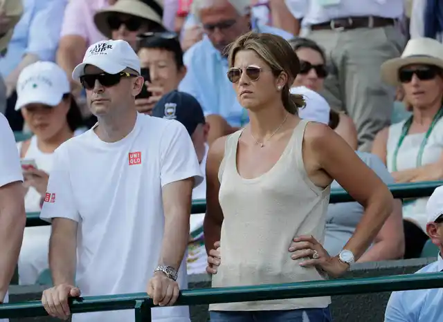 Mirka Federer, wife of, Switzerland’s Roger Federer watches from the stands after he lost his men’s quarterfinals match against Kevin Anderson of South Africa, at the Wimbledon Tennis Championships.