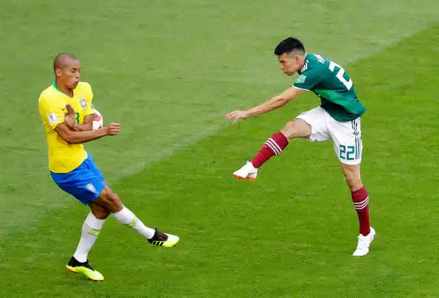 Even Hirving Lozano (right), the hero of Mexico’s victory over Germany, couldn’t find a way past the indomitable defence