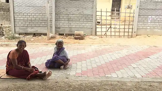 It has been a month since her husband was arrested. Raji waits every day under the neem tree.