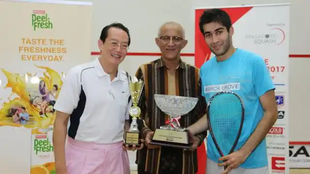 Ramit Tandon beat James Huang 11-3 11-6 11-3 to win the Singapore Open.