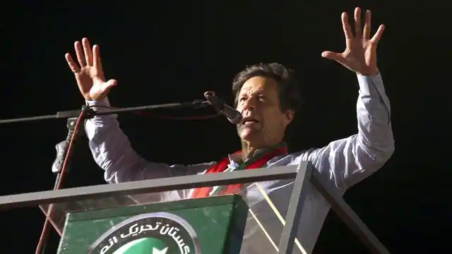 Pakistani politician Imran Khan, chief of Pakistan Tehreek-e-Insaf party, addresses an election rally in Karachi, Pakistan