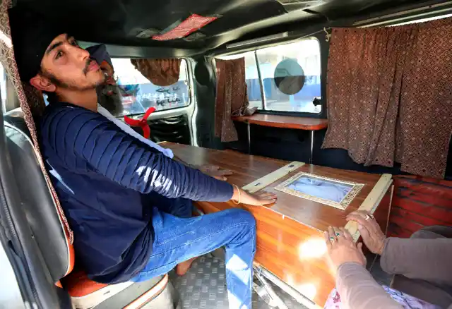 Relatives carry the dead body of the a victim of the blasts on 1July.
