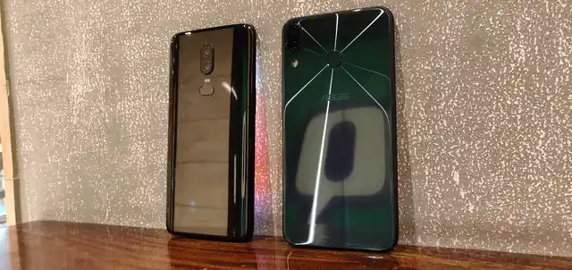 Both the phones are fingerprint magnets because of the glass back 