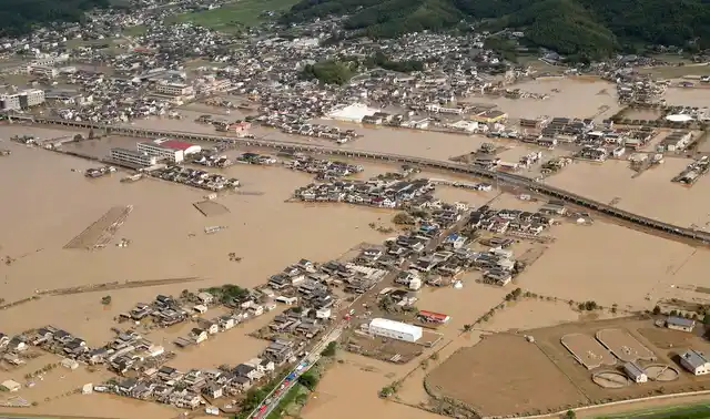 A submerged housing area in Kurashiki, Okayama prefecture, western Japan, on Monday, 9 July. 