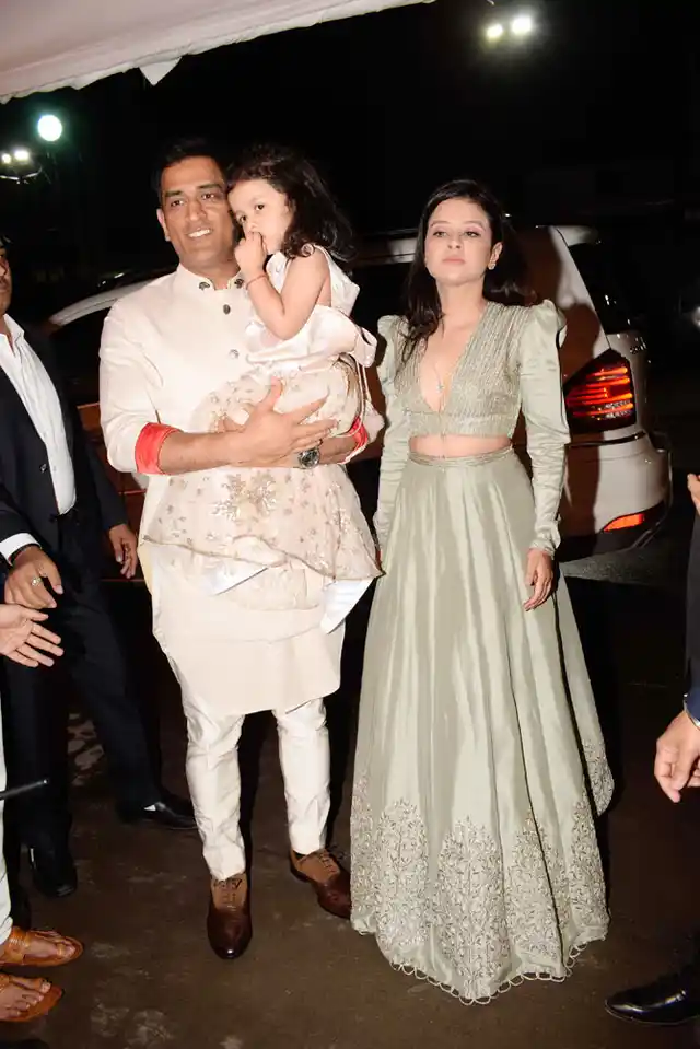 Sakshi Singh Dhoni along with husband, MS Dhoni and daughter, Ziva at Poorna Patel’s wedding reception. 