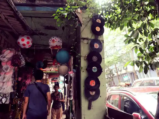 Unused or damaged records used to decorate the pillar adjacent to the shop.