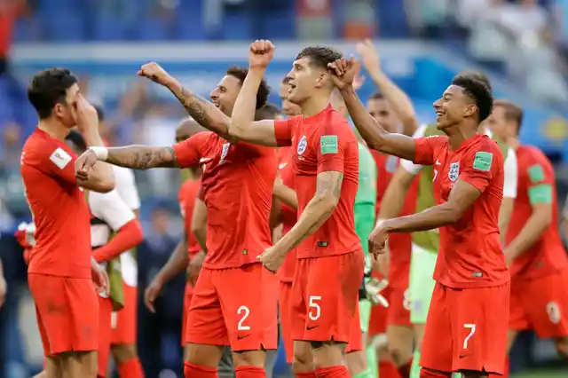 England team players celebrate their victory over Sweden at the end of the quarterfinal match between Sweden and England at the 2018 soccer World Cup in the Samara Arena, in Samara, Russia, Saturday, July 7, 2018. 