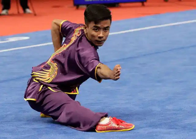 India’s Suraj Singh Mayanglambam performs during the Wushu men’s Changquan games at the 18th Asian Games in Jakarta, Indonesia on Sunday, Aug. 19, 2018. 