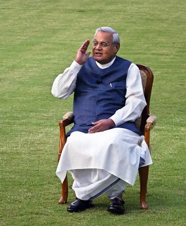 25 March, 2004 file photo, Indian Prime Minister Atal Bihari Vajpayee gestures during a photo session at his residence. 