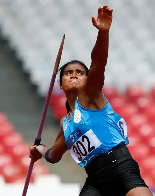 India’s Purnima Hembram throws the javelin in the heptathlon during the athletics competition at the 18th Asian Games.