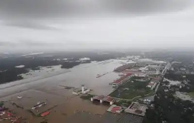 Kerala: An aerial view of the flood-hit areas of Kerala on Aug 18, 2018. Overflowing rivers and a series of landslides have caused the death of 180 people as of Saturday morning, with over three lakh people forced to move to some 2,000 relief camps. The disaster has triggered an unprecedented rescue and relief operation led by the Army, the Air Force and the Navy along with teams of National Disaster Response Force involving about 1,300 personnel and 435 boats. Prime Minister Narendra Modi on Sa