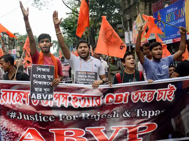 ABVP students shout slogans during a protest rally.