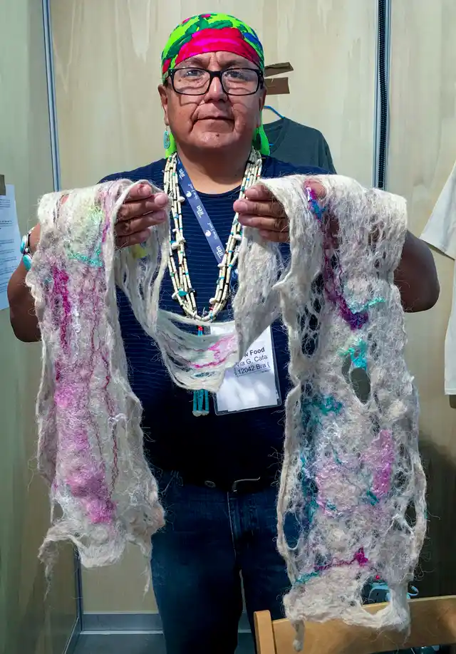 Roy Kady from Arizona, USA, with his hand-felted scarves.