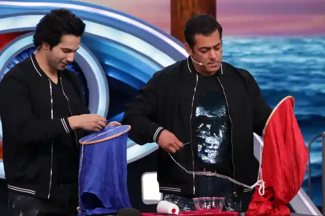 Varun shows Salman how to take the ‘Sui Dhaaga Challenge’.