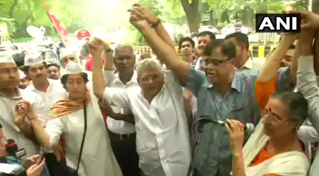 Left leaders Sitaram Yechury and D Raja with AAP leader Atishi.