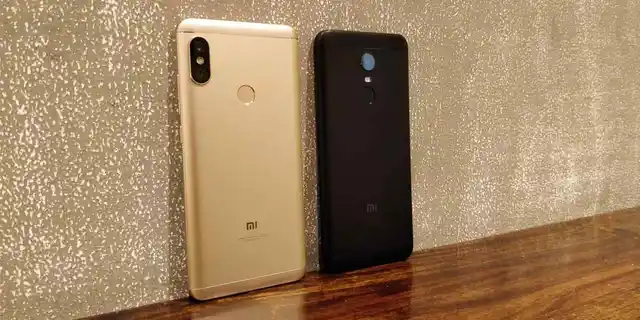 The Redmi Note 5 Pro (left) comes with a dual camera setup.
