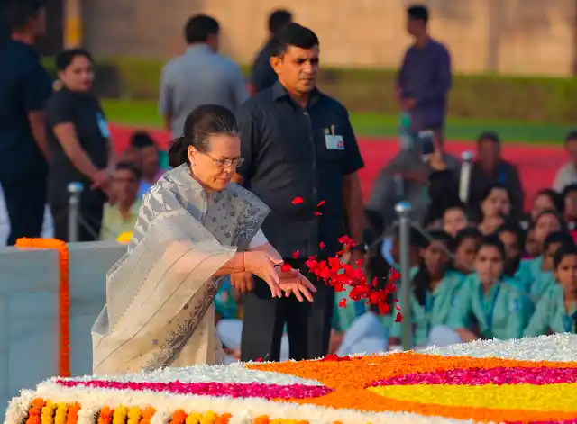 Sonia Gandhi pays tribute at Rajghat on the occasion of Mahatma Gandhi’s 150th birth anniversary. 