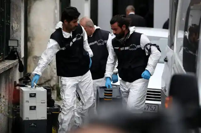 Turkish forensic police officers enter the Saudi consulate in Ankara.