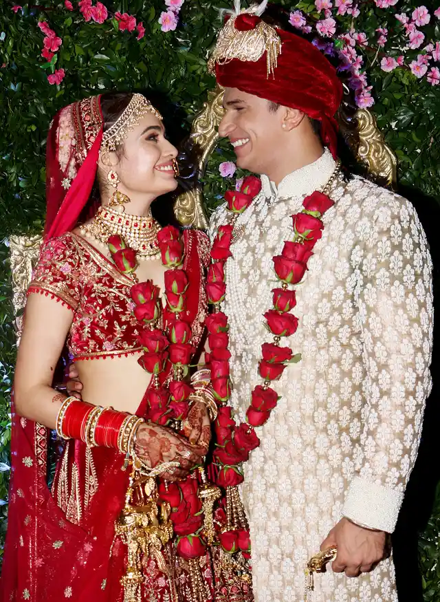 The couple posed for the shutterbugs at 2am after the wedding.