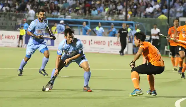 Chinglensana Singh looks for an opening.
