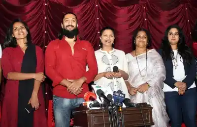 Bengaluru: Filmmaker Kavitha Lankesh with actors Sruthi Hariharan and Chetan Kumar during a press conference, in Bengaluru on Oct 21, 2018. (Photo: IANS)