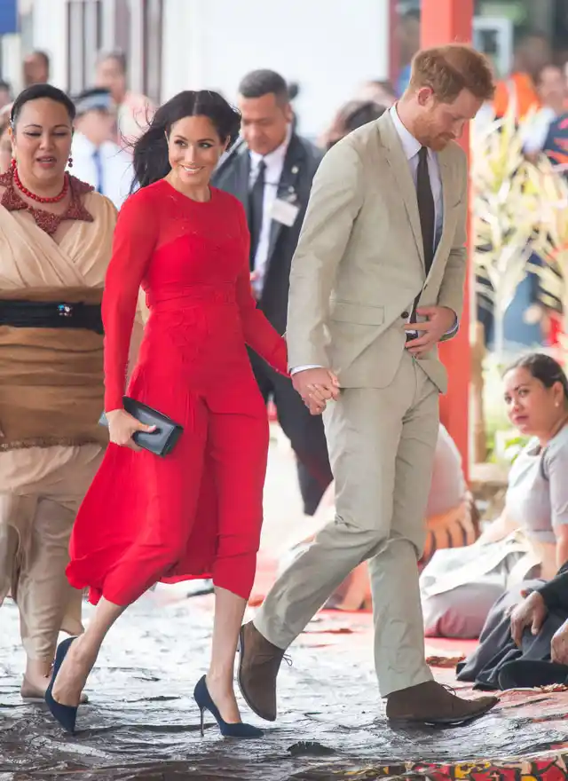 Meghan Markle and Prince Harry holding hands