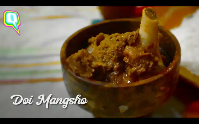 Doi Mangsho or mutton cooked in curd. 