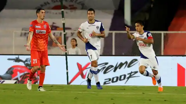 Sunil Chhetri of Bengaluru FC celebrates two successive goals with teammates against FC Pune City on Monday.