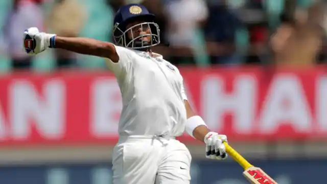India’s Prithvi Shaw celebrating after reaching his hundred against West Indies on Thursday in Rajkot.